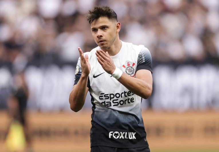 Romero com a camisa do Corinthians.